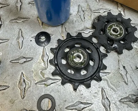 Derailleur pulley wheels disassembled for service