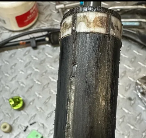 Fork stanchion showing wear before service